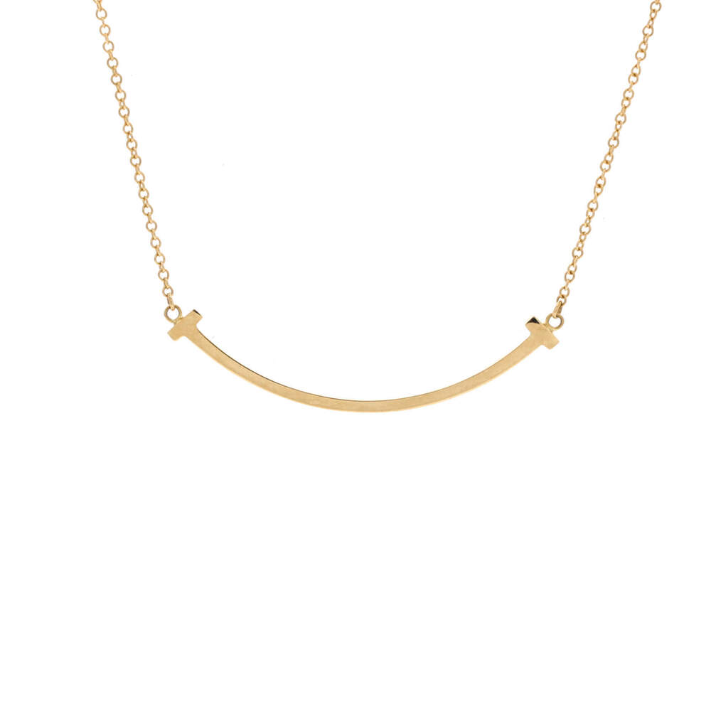 Tiffany & Co. Small T Smile Pendant Necklace 18K Yellow Gold